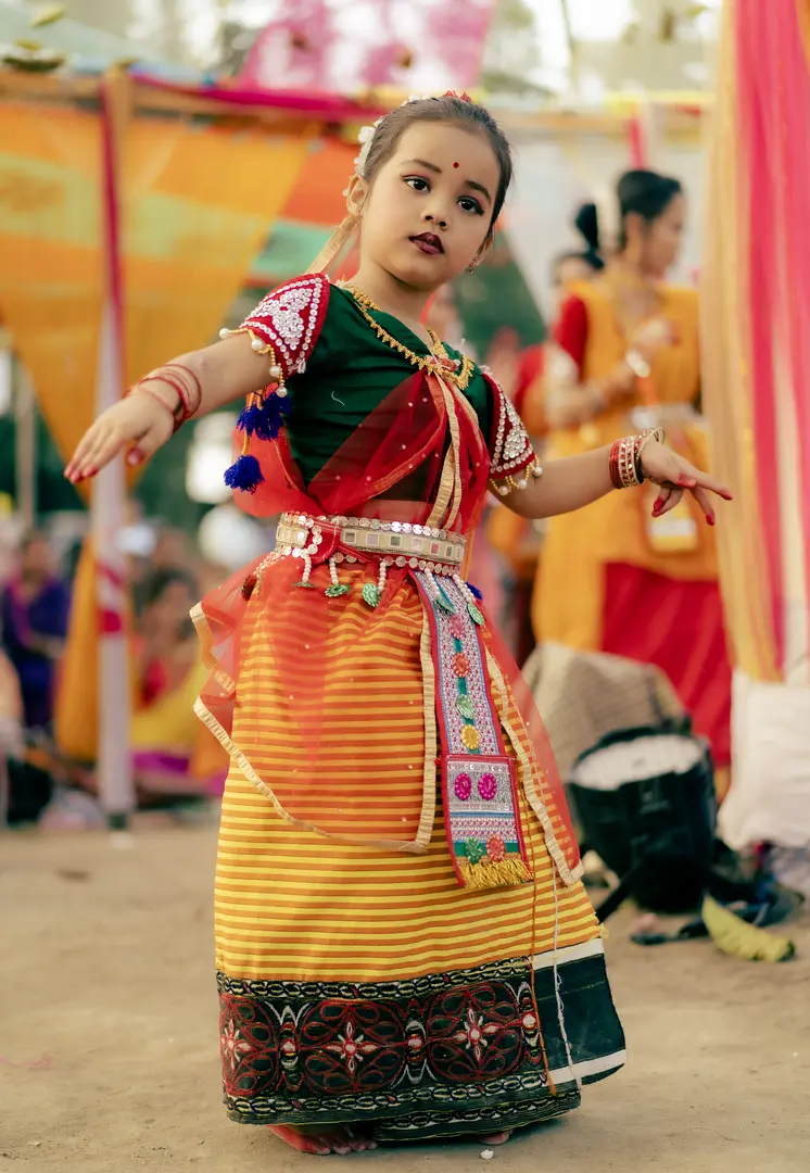 A bishnupriya manipuri little girl performing traditional dance